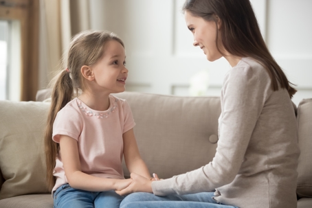 mother talking to daughter